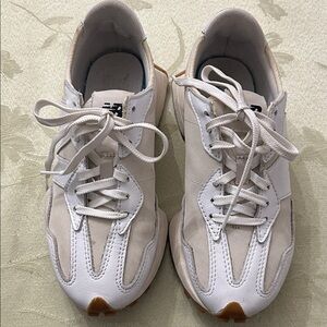 New Balance , gently used, white , comfy, beautiful with skirt & fashion pants